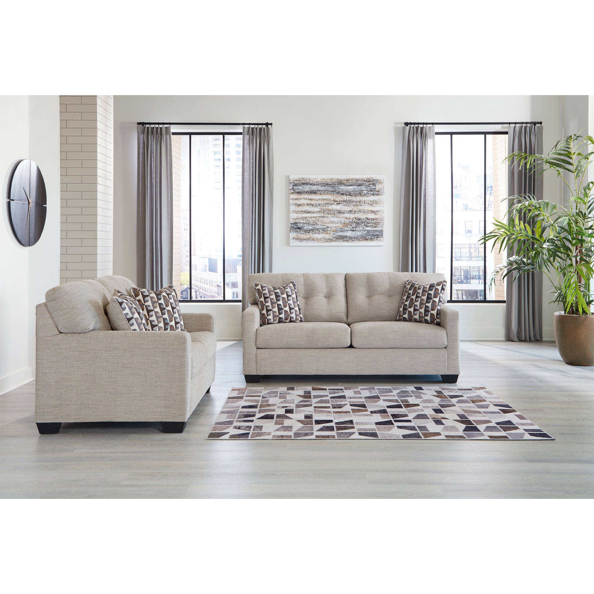Luxurious pebble-colored Mahoney Sofa and Loveseat, perfect for elegant lounging in Milwaukee
