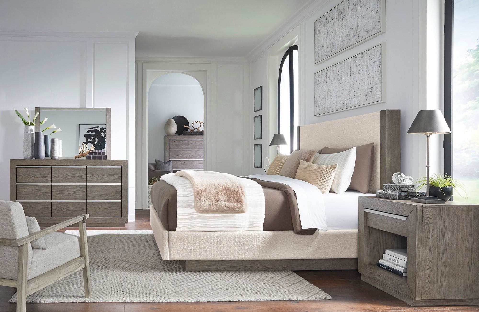 Anibecca King Upholstered Panel Bed with Mirrored Dresser